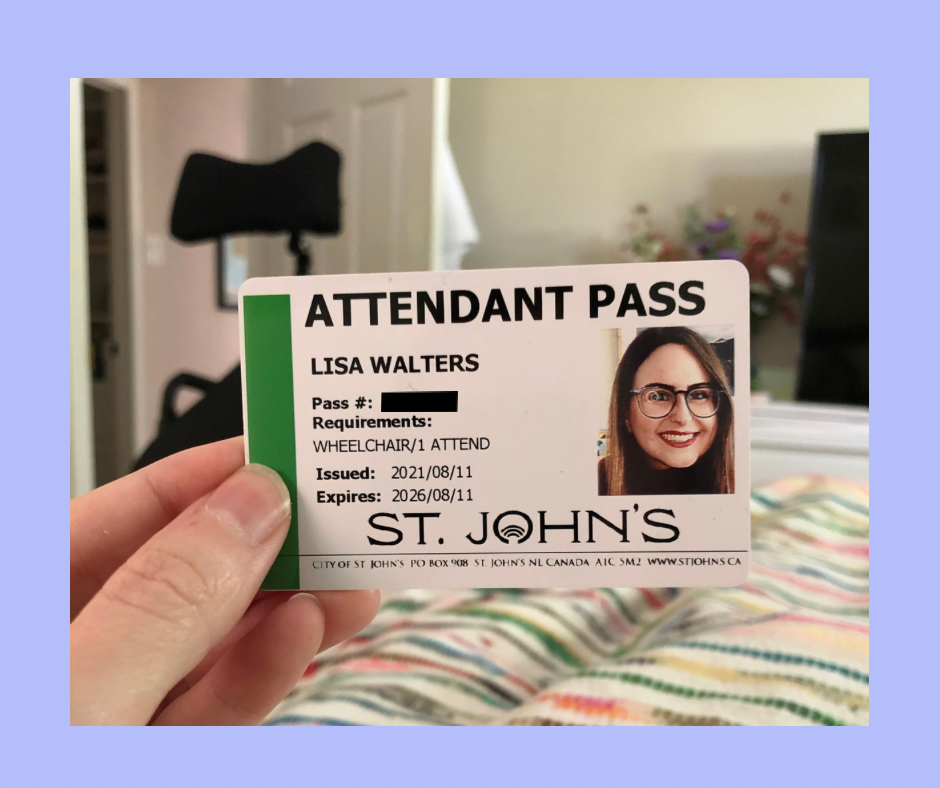 My hand holding a white card from the City of St. John's that says Attendant Pass at the top, along with my information and a photo of me. 