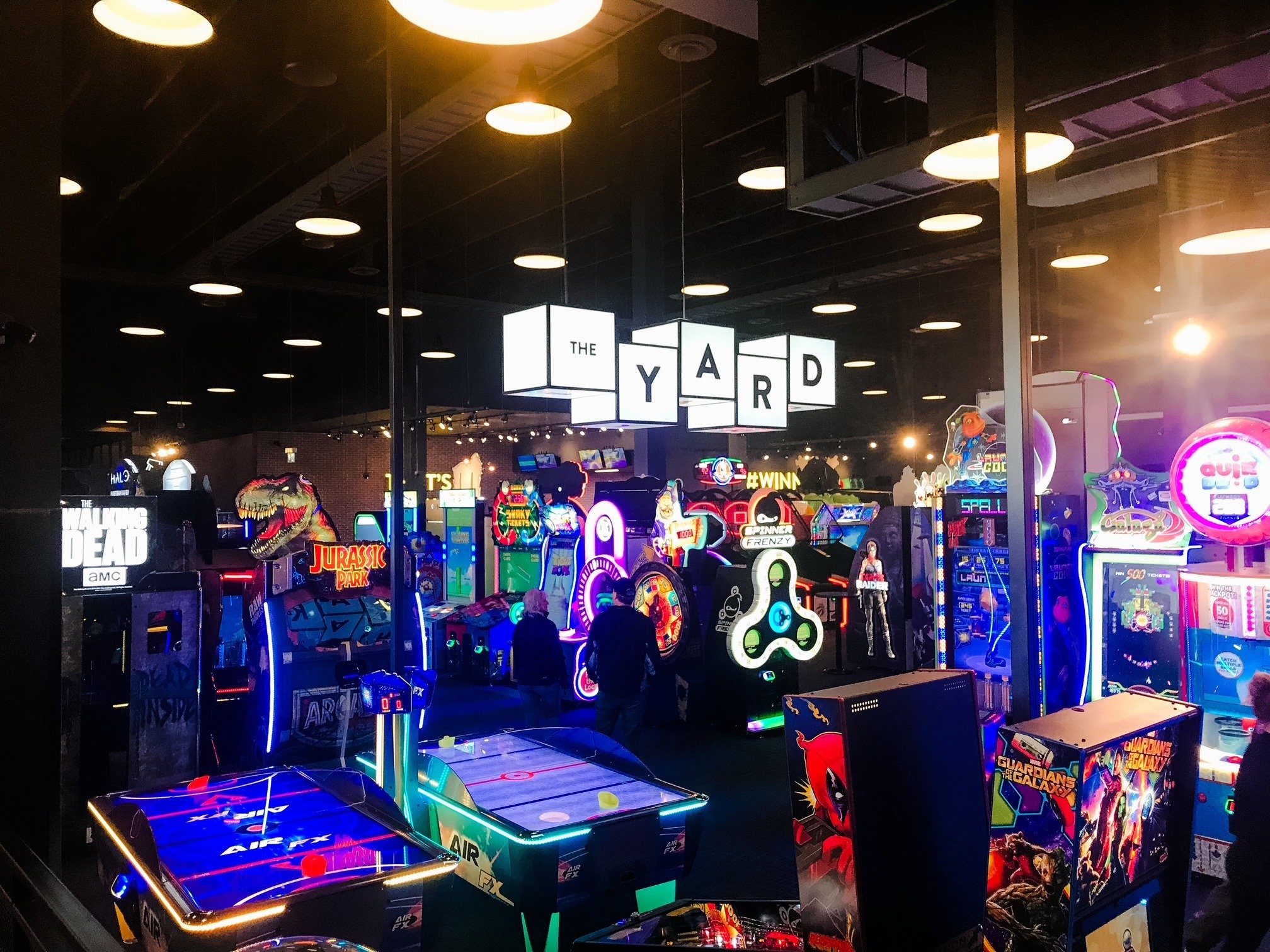 A photo of the section of the Rec Room called The Yard, where all of the arcade games are located.